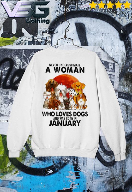 Official Never underestimate an old Woman who loves Dogs and was born in January s Sweater